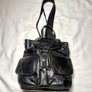 Black Leather Backpack Purse with adjustable straps for carrying or wearing
